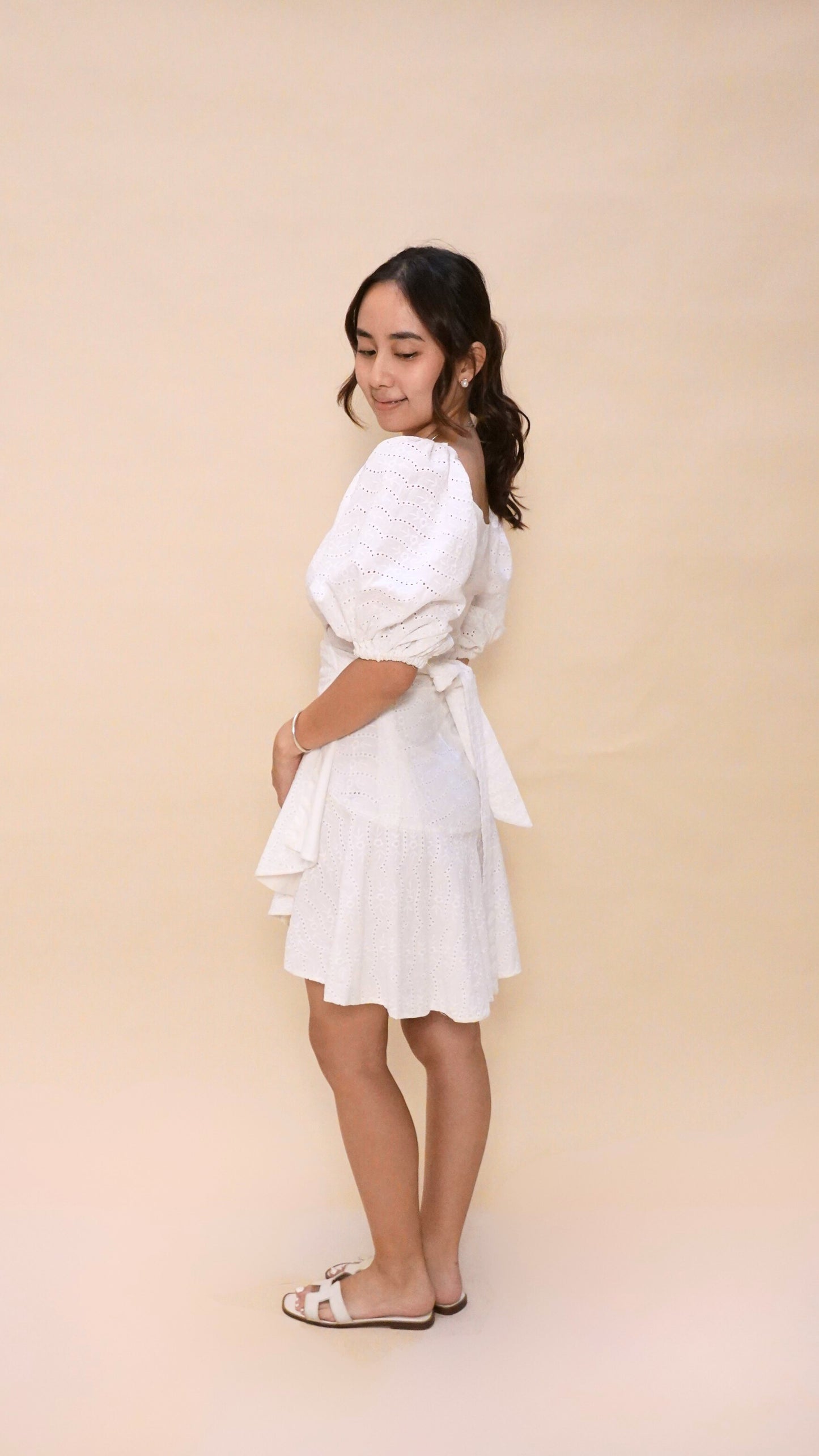 Jun Escario | Eyelet wrap mini dress